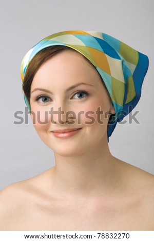 stock photo Portrait of young beautiful girl with naked shoulders 