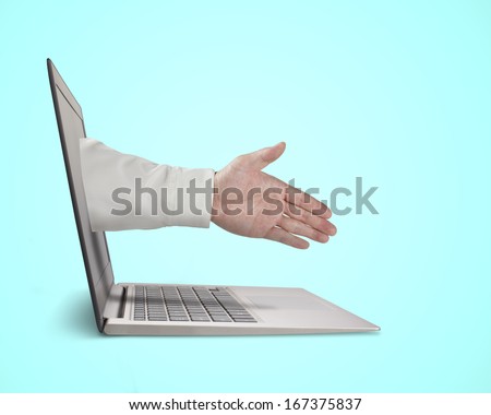 Business man hand reaching out from screen to shake with,  in green background