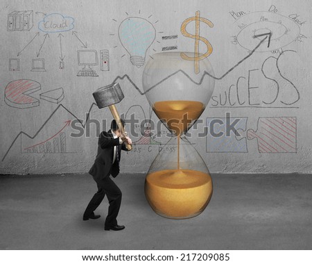 businessman holding hammer to strike sandglass  with doodles wall