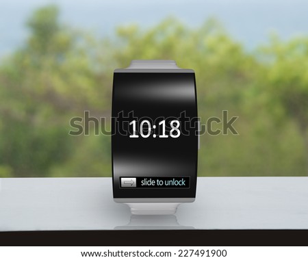 ultra-thin black glass bent interface smartwatch with metal watchband on desk and nature background