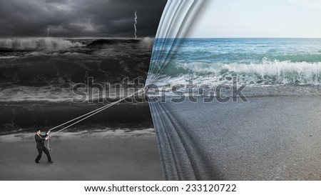 businessman pulling open calm sea curtain covered dark stormy ocean background