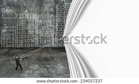 businessman pull blank white curtain covered old dirty cityscape doodles concrete wall background
