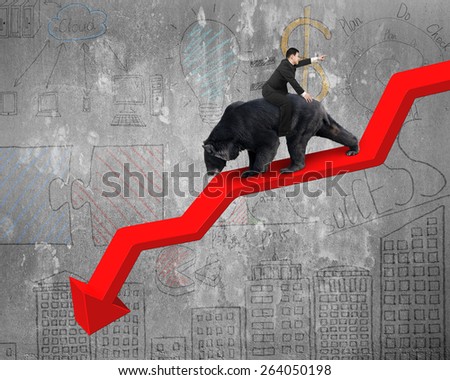 Businessman riding black bear on red arrow downward trend line with business doodles concrete wall background. Fight back bearish market concept.