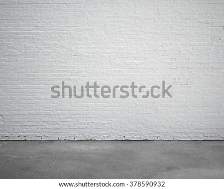 room interior with white brick wall and concrete floor, nobody, empty