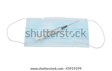 Medical syringe and medical mask. Isolated object.