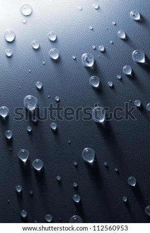Water drops on the embossed surface of tension ceiling