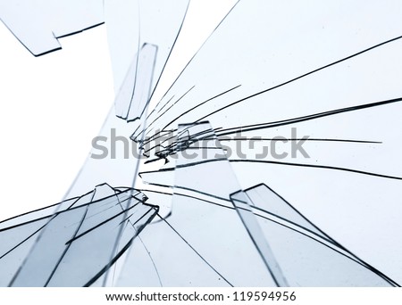 Broken glass fragments above white. Abstract background texture