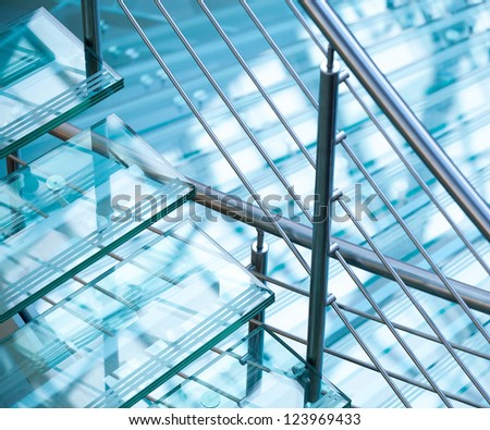 Modern Interior Abstract Fragment With Steel Railings And Stairs Made Of Glass