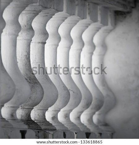 Row of white balusters. Abstract classical architecture fragment