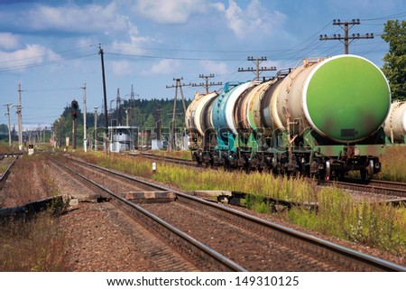 Tank cars stand on cargo railway station