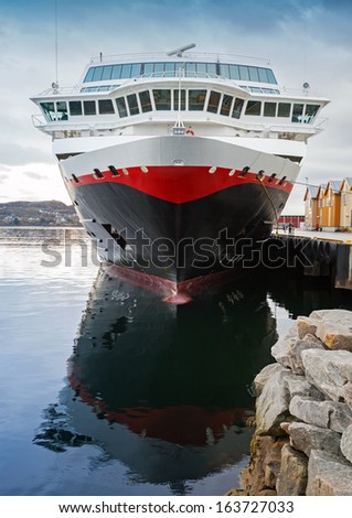 Front view of moored big modern passenger cruise ship
