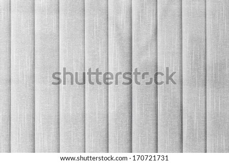White vertical textile blinds. Photo background texture