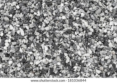Seamless background photo texture of black and white gravel