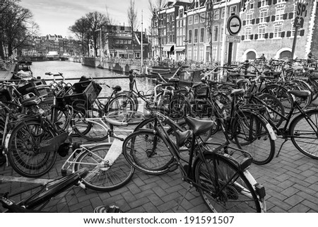 AMSTERDAM, NETHERLANDS - MARCH 19, 2014: Large group of bicycles stand on a parking place