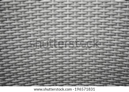 Gray wicker furniture surface. Background photo texture