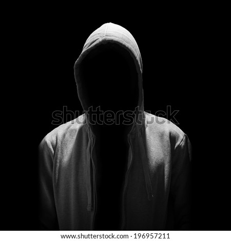 Portrait of Invisible man in the hood isolated on black background