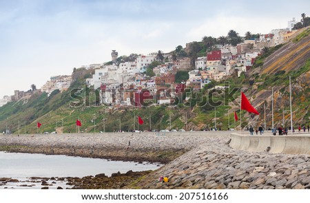 Coastal street panorama with flags, Tangier, Morocco