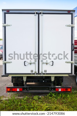 Rear view of new white cargo truck