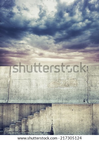 Photo background with concrete stairway and dark cloudy sky