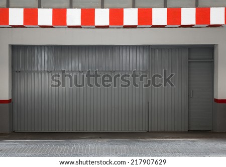 Empty urban interior with parking gate and striped border