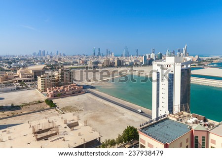 Manama, Bahrain - November 20, 2014: Bird view of Manama city, Bahrain. Skyline with modern buildings standing on coast of Persian Gulf