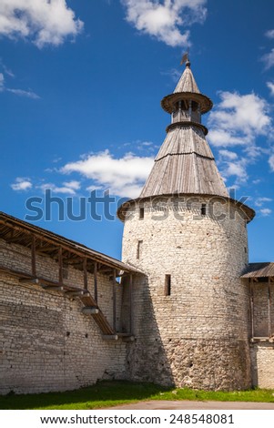 Classical Russian ancient architecture. Stone tower of old fortress. Kremlin of Pskov, Russia