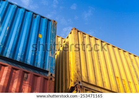 Colorful metal Industrial cargo containers are stacked in the storage area