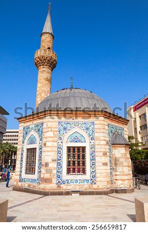 Izmir, Turkey - February 5, 2015: Ancient Camii mosque on Konak square, Izmir, Turkey