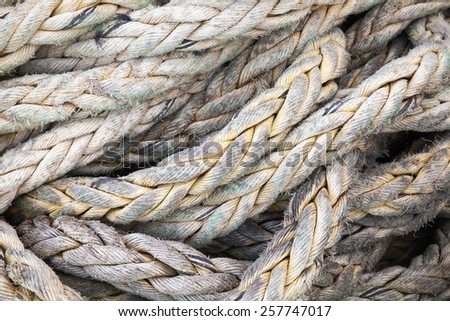 Dark gray nautical rope, closeup background texture