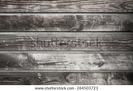 Dark gray wooden wall made of boards, background photo texture