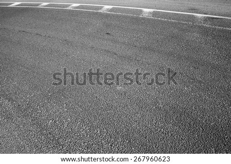 Abstract asphalt road fragment with marking lines, automotive transportation background