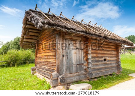 Wooden architecture example, small rural Russian bath building in a rural courtyard