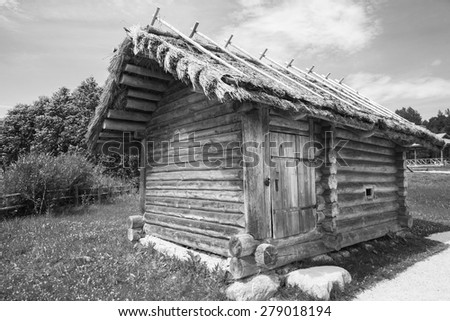 Wooden rural architecture example, small Russian bath typical building, black and white photo