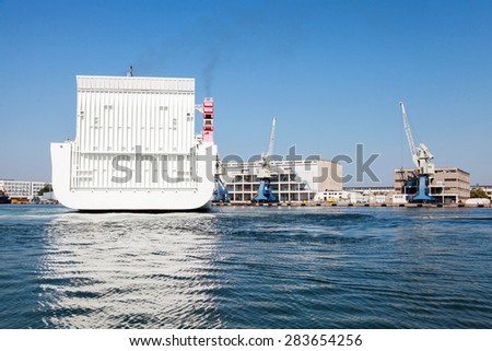 Stern of big white cargo ferry with closed transportation gate, Fish port of Burgas, Bulgaria