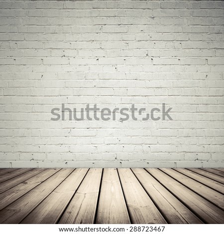 Abstract white interior with wooden floor and brick wall, vintage toned, old style instagram filter effect