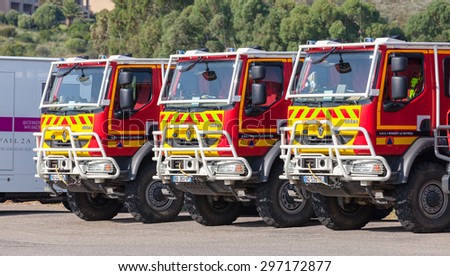 Propriano, France - July 4, 2015: Three Renault trucks of French civil security military formations stands in a row. French Government civil defence agency transport
