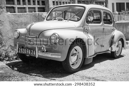 Ajaccio, France - July 6, 2015: Renault 4CV old-timer economy car stands parked on a roadside in French town