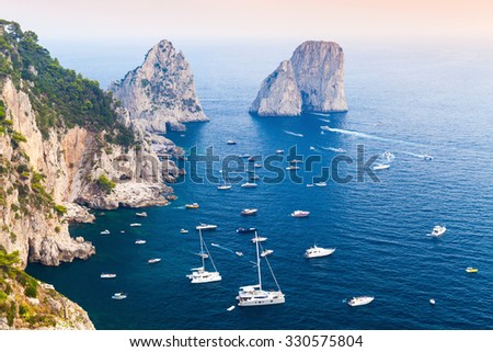 Capri island, Italy. Mediterranean Sea coastal landscape with rocks and yachts