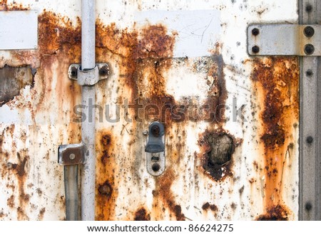 Old rusted cargo container door closeup texture