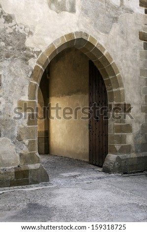 Entrance door of a medieval castle in Europe.