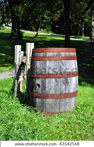 Old wood barrel abandoned in rural area