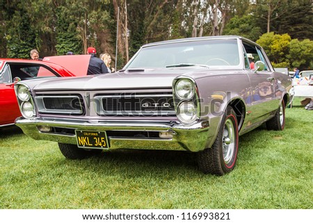 SAN FRANCISCO - SEPTEMBER 29: A 1965 Pontiac GTO is on display during the 2012 Jimmy\'s Old Car Picnic in Golden Gate Park in San Francisco on September 29, 2012