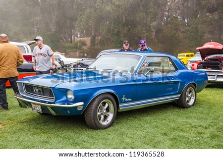 SAN FRANCISCO - SEPTEMBER 29: A 1968 Ford Mustang Coupe is on display during the 2012 Jimmy's Old Car Picnic in Golden Gate Park in San Francisco on September 29, 2012