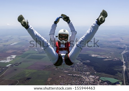 A girl performs in a free fall free style.