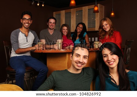 Diverse Group of Friends in Cafe