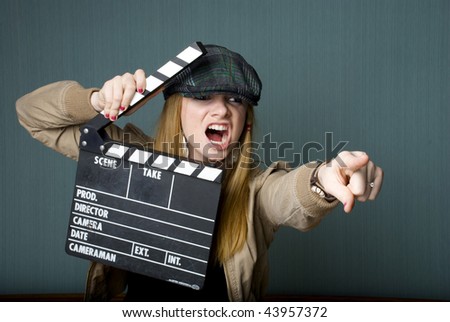 Young Female Director with slate pointing