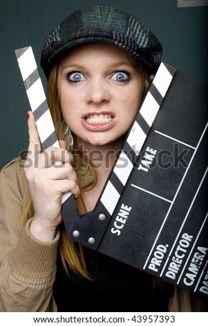 Angry Young Female Director with slate