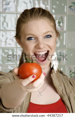 Healthy Eating, Beautiful Woman holding tomato