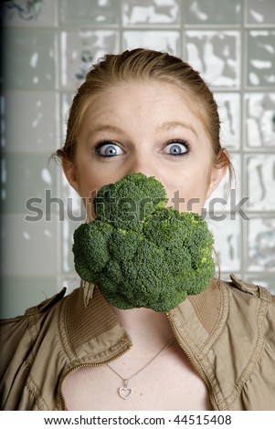Fun Food, Healthy Eating, Woman with broccoli in her mouth
