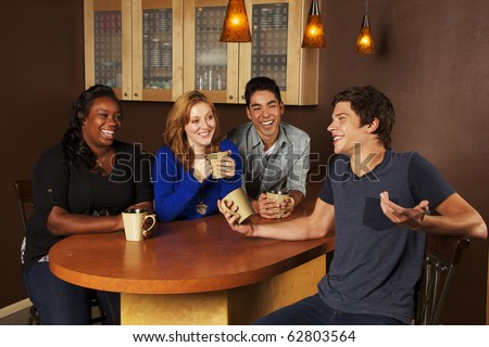 Young Adults hanging out in coffee house